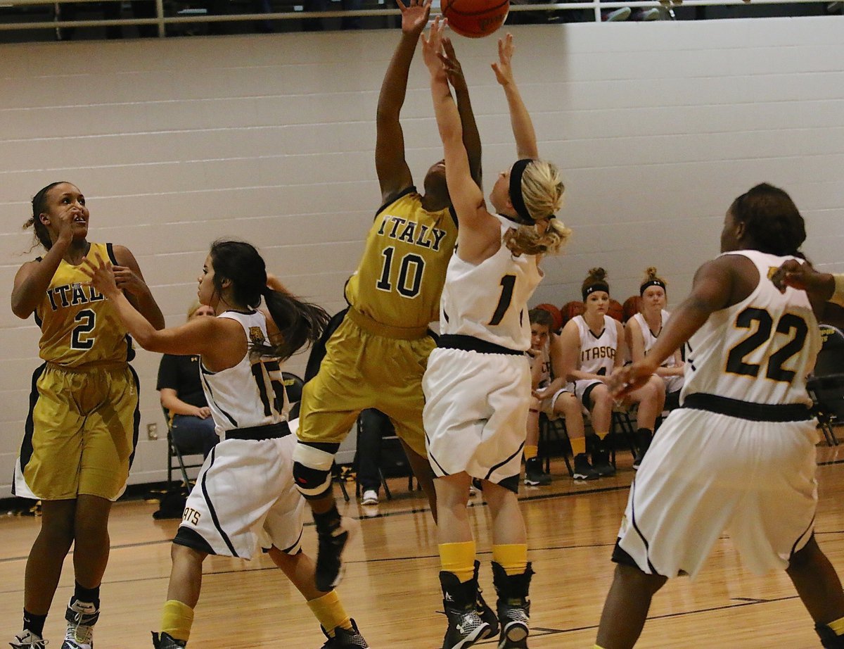 Image: Italy’s K’Breona Davis(10) is fouled while going up for a shot under the basket.