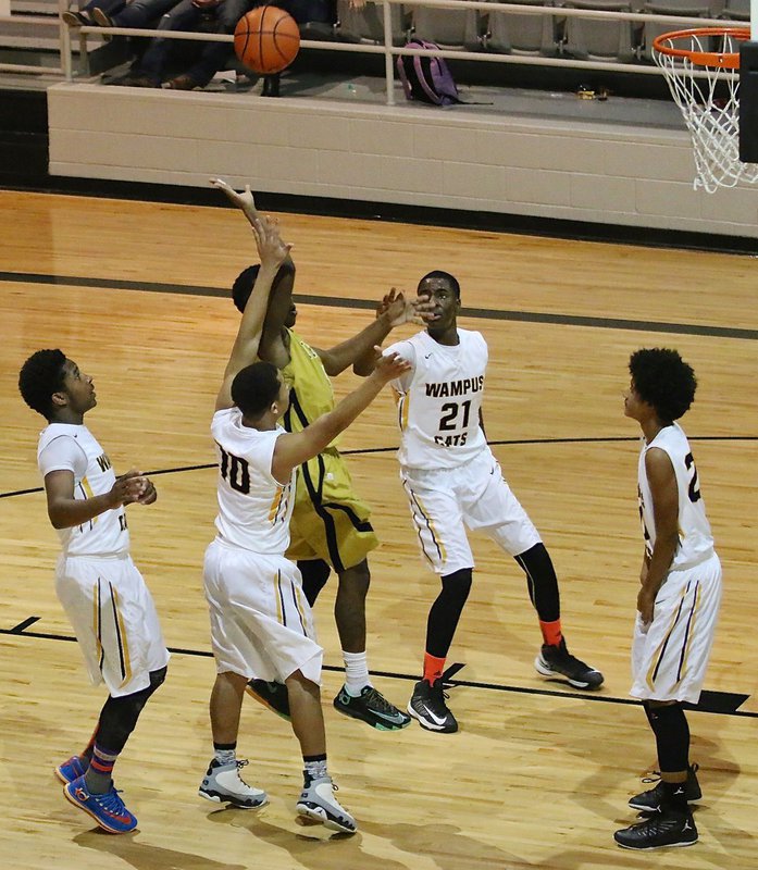 Image: Kevin Johnson(5) attacks the rim for the Gladiators.