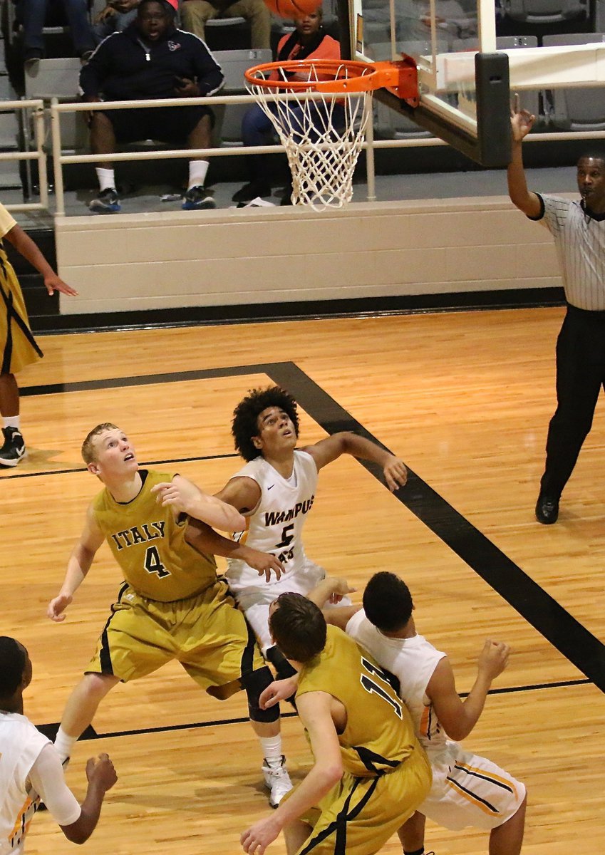 Image: Gladiators Cody Boyd(4) and Ryan Connor(11) fight for rebounding position.