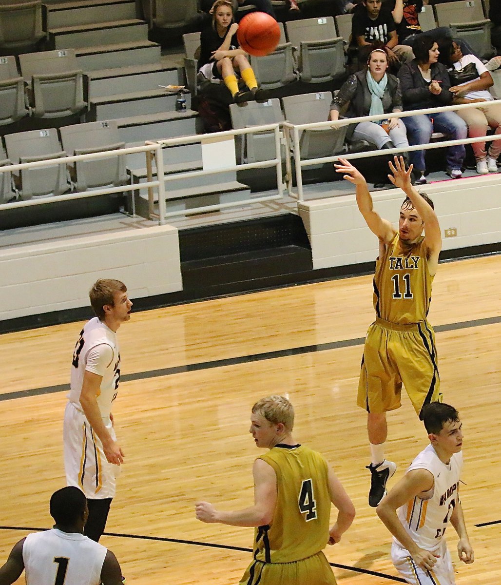 Image: Gladiator Ryan Connor(11) drops in three-ball from the top of the arc.