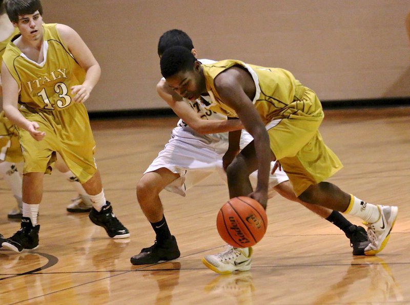 Image: JV Gladiator Byron Lusk, Jr. creates a turnover with teammate Cade Roberts(13) nearby to help.