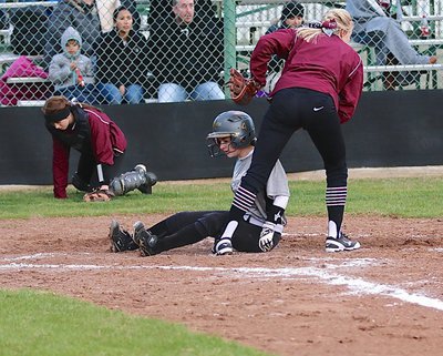 Image: Lady Gladiator Britney Chambers(4) makes it home to beat the throw by Red Oak.