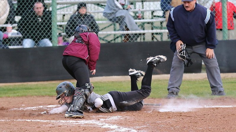 Image: Italy senior Kelsey Nelson(14) beats the throw to home with a head-first slide during a scrimmage. Italy unloaded their offensive weaponry on the visiting Lady Hawks who struggled to keep pace with the Mighty Lady Gladiators.