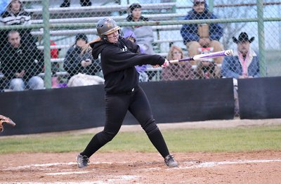 Image: Jaclynn Lewis(15) blasts a bases loaded double for the Lady Gladiators.