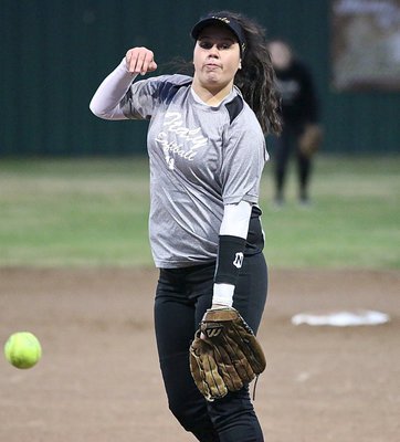 Image: Jenna Holden(11) puts in some work on the mound for the Lady Gladiators.