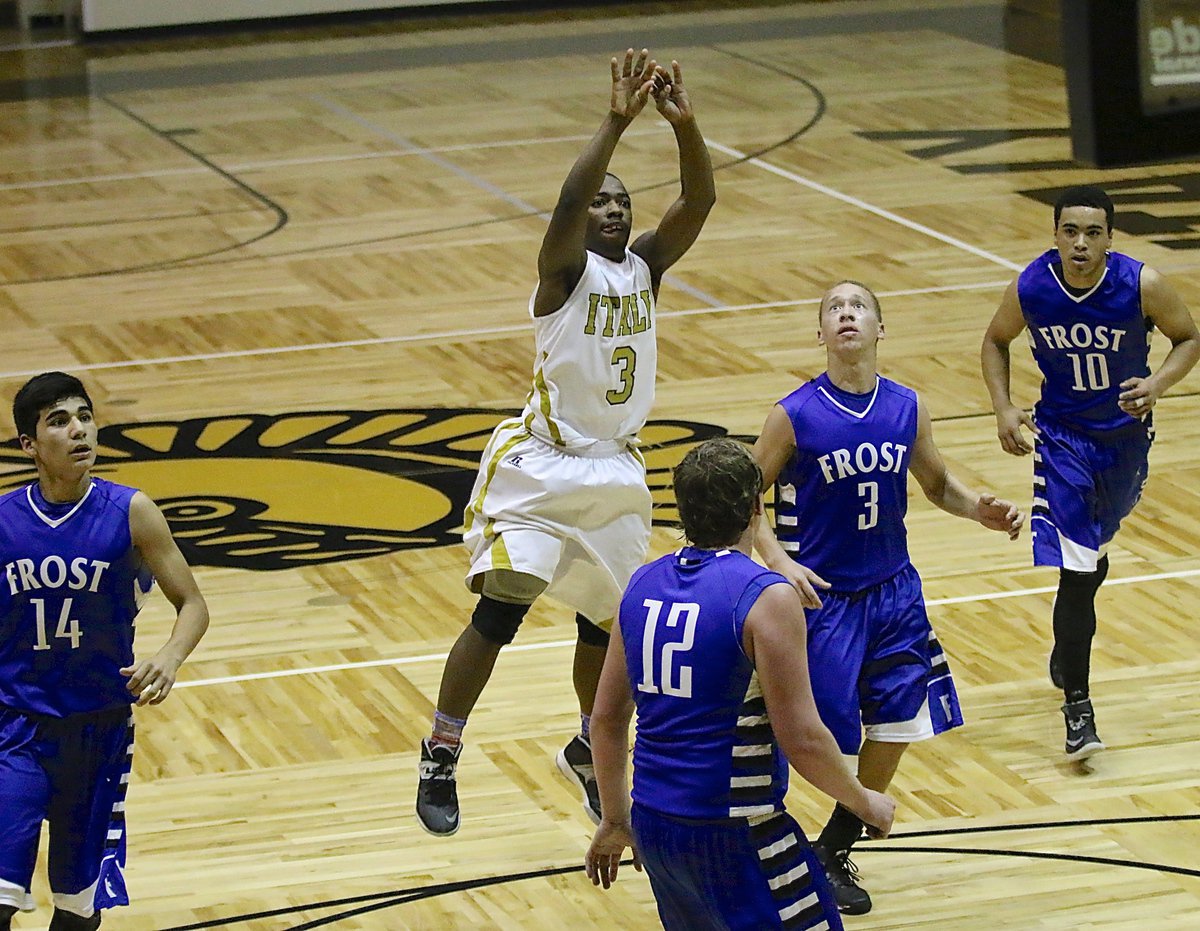 Image: Gladiator Kendrick Norwood(3) pulls up at the top of the lane for a jumper.