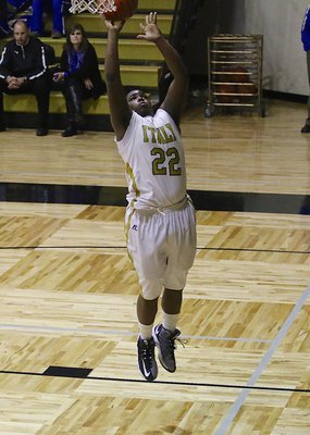 Image: Kenneth Norwood, Jr.(22) scores an open layup to finish the fast break against Frost.