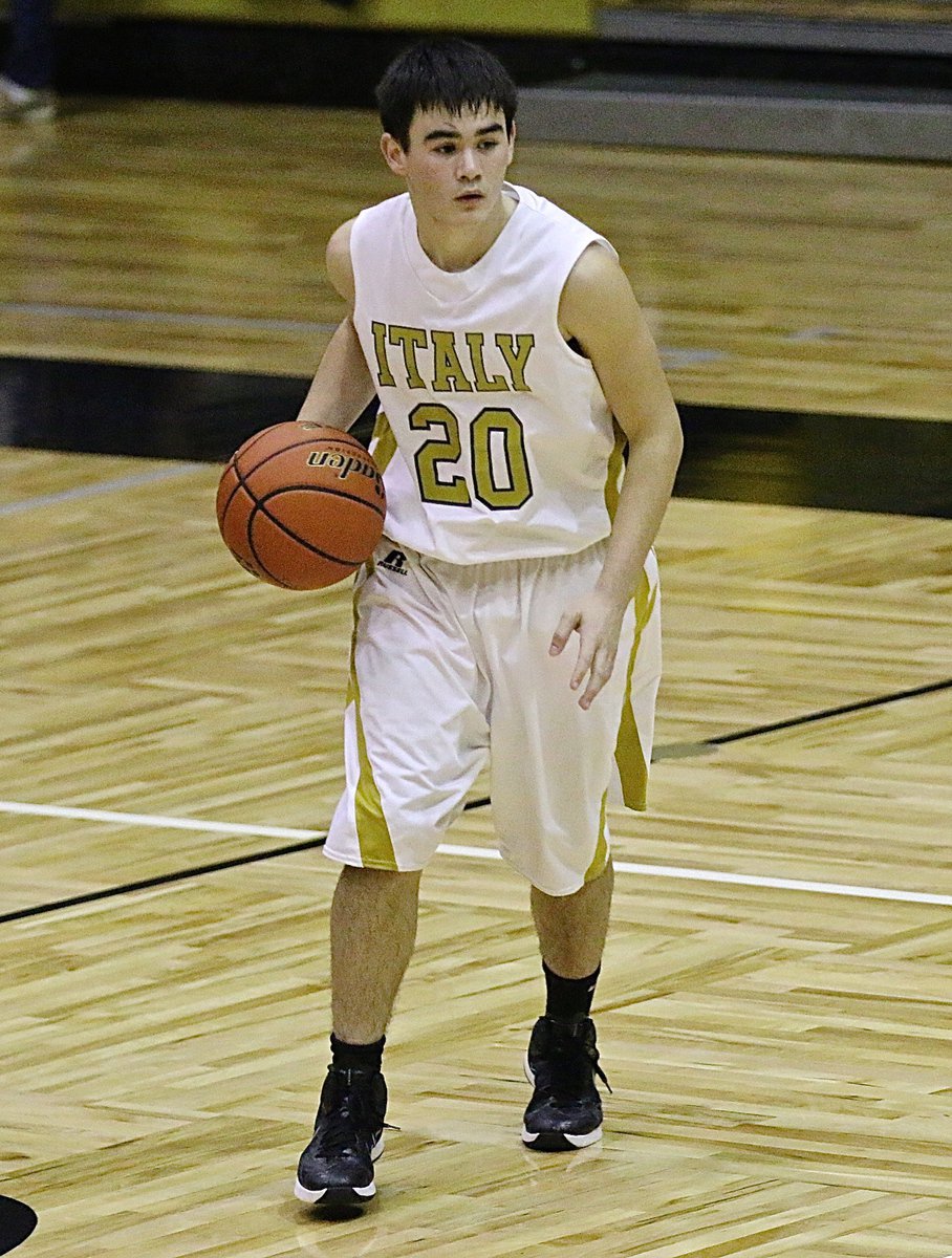 Image: Kyle Tindol(20) brings the ball the court for the Gladiators.