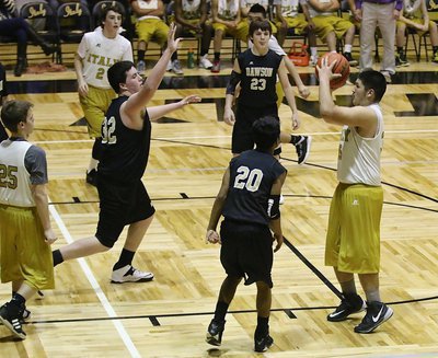 Image: Italy 8th grader Alex Garcia(35) pulls up from just outside the elbow before Dawson’s big man can reach him.