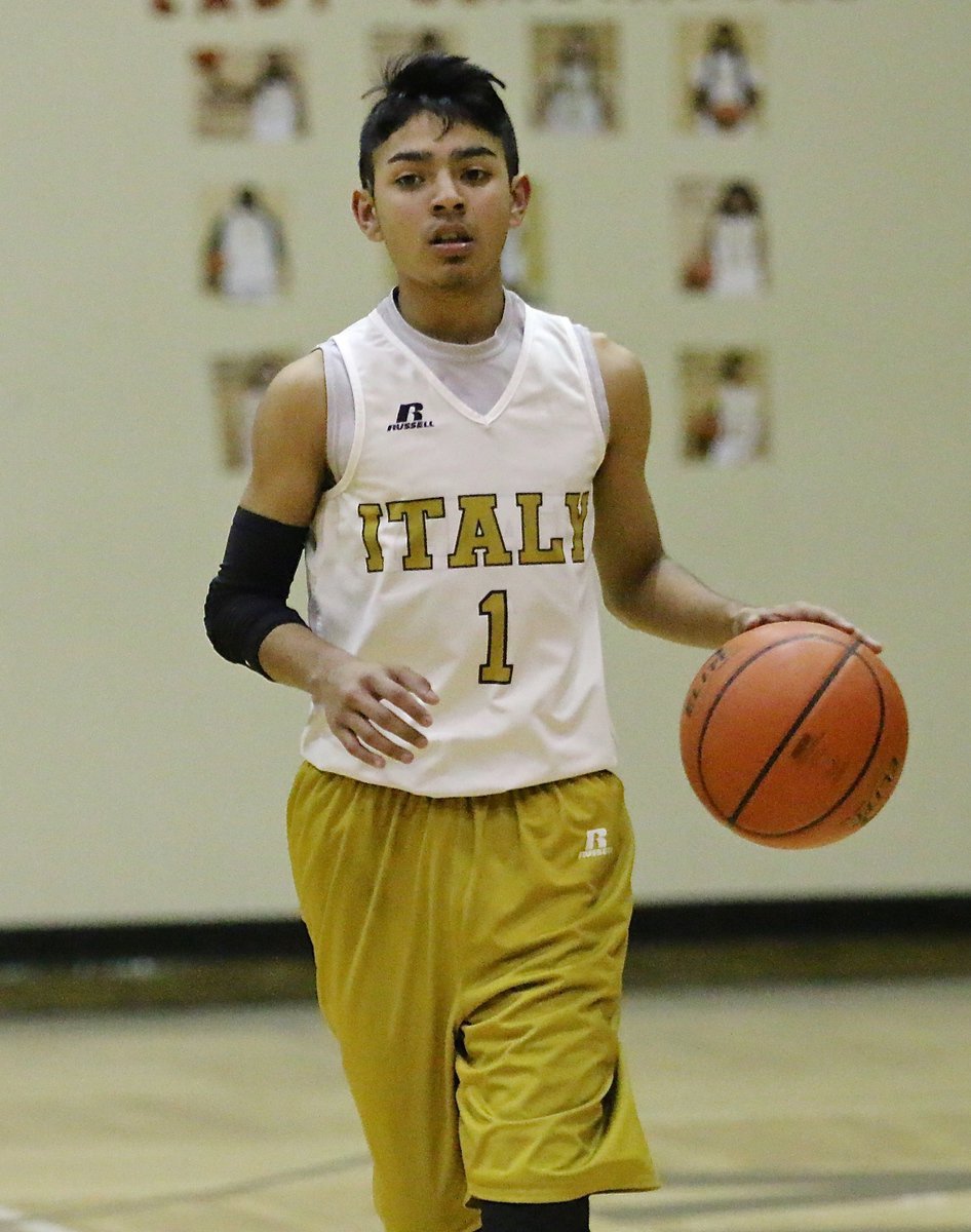 Image: Guard Marcos Duarte(1) brings the ball up court for Italy’s 8th graders.