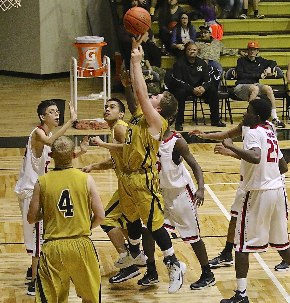 Image: John Escamilla(13) gets up a shot in front of the rim for Italy.