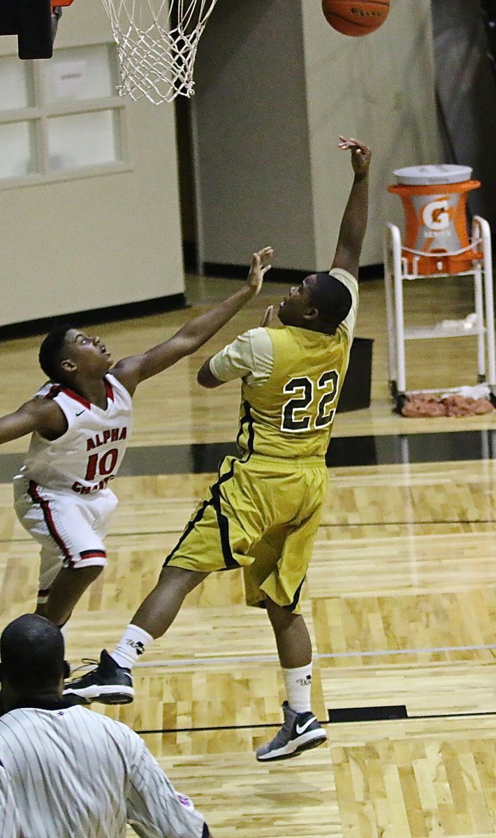 Image: Kenneth Norwwod, Jr.(22) gets the baby hook to drop to finish a fast break opportunity for Italy, and finish off Garland Alpha Charter.