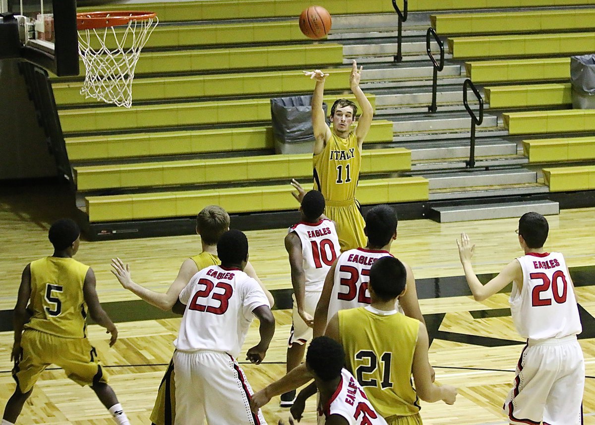 Image: Gladiator junior Ryan Connor(11) tries a jumper and then later knocks down a three-ball in the opening period against Garland Alpha Charter.