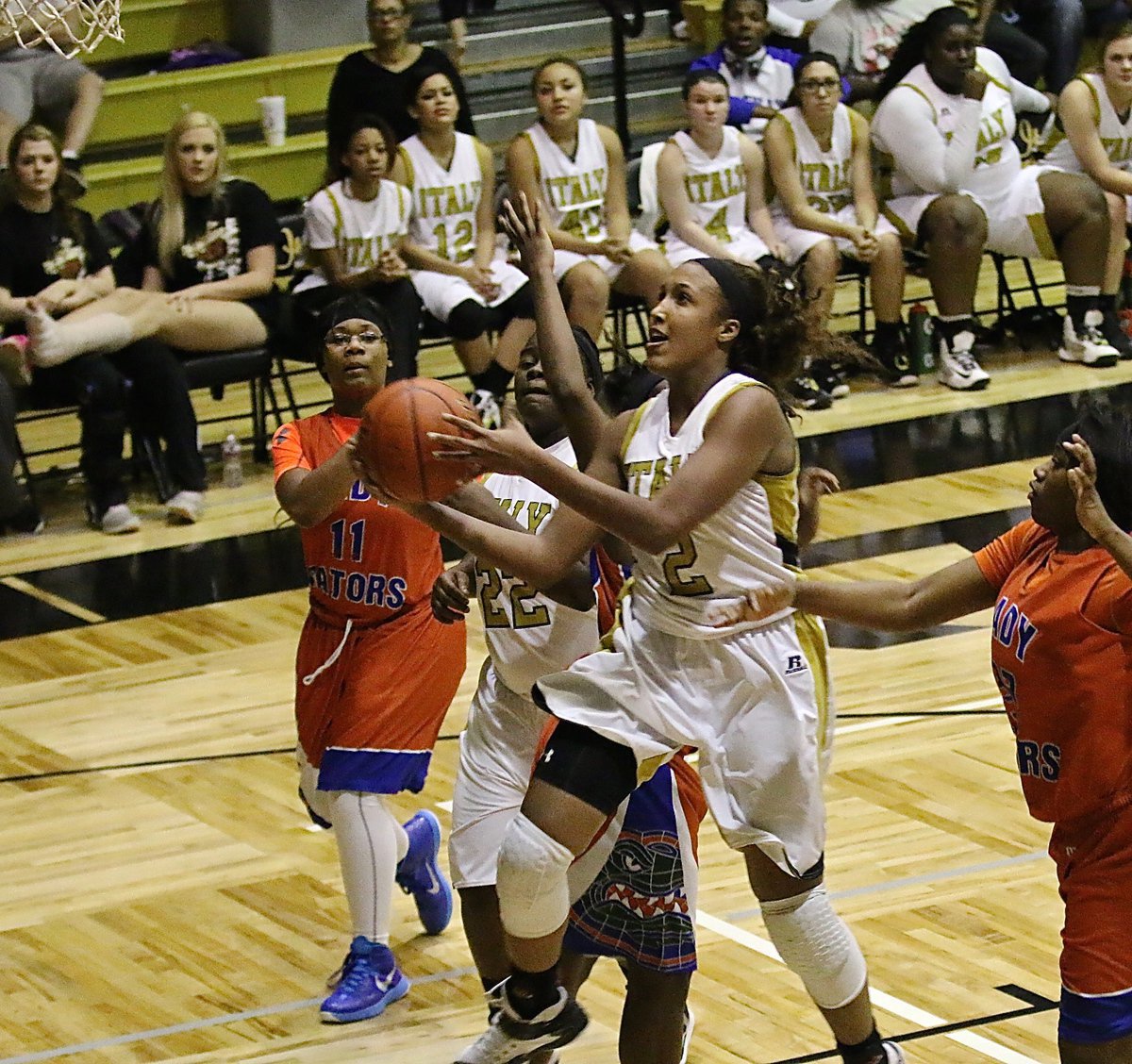 Image: Emmy Cunningham(2) reaches the basket to finish with 32-points in Italy’s last home district game.