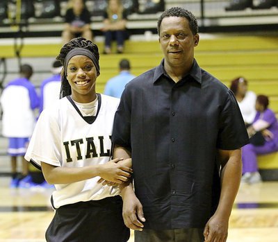 Image: Lady Gladiator senior Kortnei Johnson(3) is honored at halftime during 2015 Senior Night while being escorted by her proud father James Johnson.