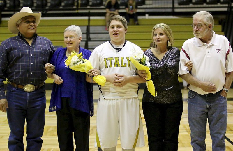 Image: Senior Gladiator John “J.T.” Escamilla(13) is honored during 2015 Senior Night inside Italy Coliseum. J.T. is escorted by his grandfather Jake Escamilla, grandmother Brenda Escamilla,  grandmother Theresa McGaha Medlin and grandfather Gary Sims who hails from Alabama.
