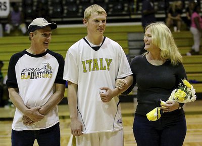 Image: Senior Gladiator Cody Boyd(4) is honored during 2015 Senior Night inside Italy Coliseum. Cody is escorted by his parents Randy and Becky Boyd.
