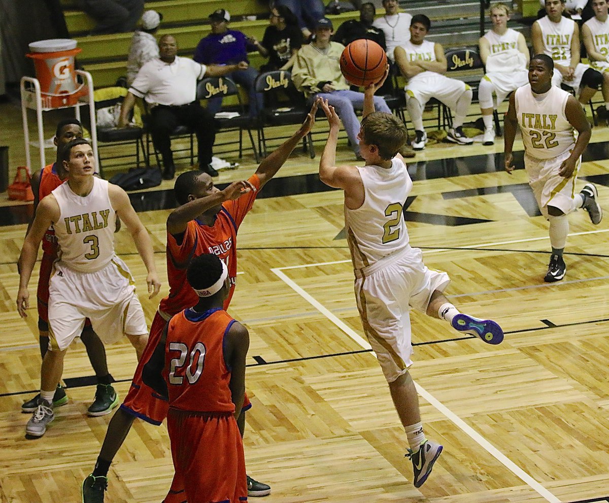 Image: Senior Gladiator Gary Kinkaid(2) grabs a board and then turns into the lane to put up a shot over Gateway with teammate Coby Jeffords(3) in rebounding position. Kincaid scored 5-points, including a three-pointer, in his final home game inside Italy Coliseum.