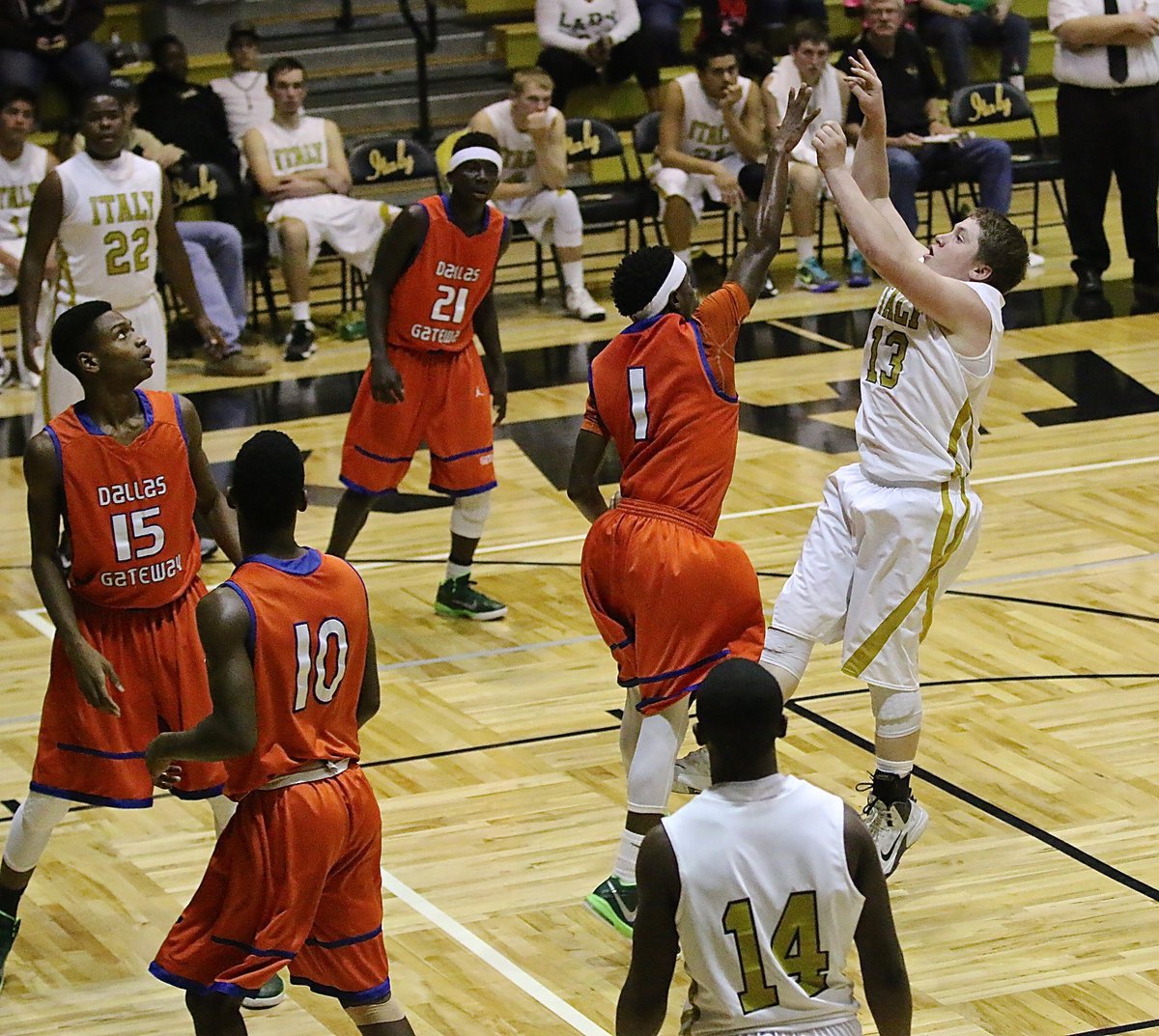 Image: John Escamilla(13) pops a jumper over a Gateway defender. Escamilla finished his final home game in the Coliseum with 8-points, including a three-pointer.