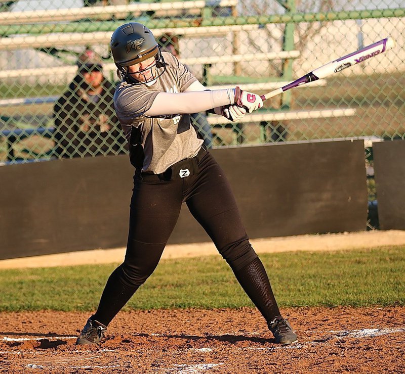 Image: Lady Gladiator Jaclynn Lewis(15) comes thru with a 2RBI double against Red Oak Life.