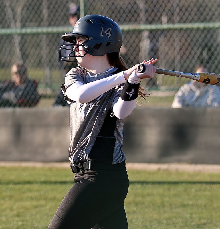 Image: Kelsey Nelson(14) belts a triple for the Lady Gladiator cause.