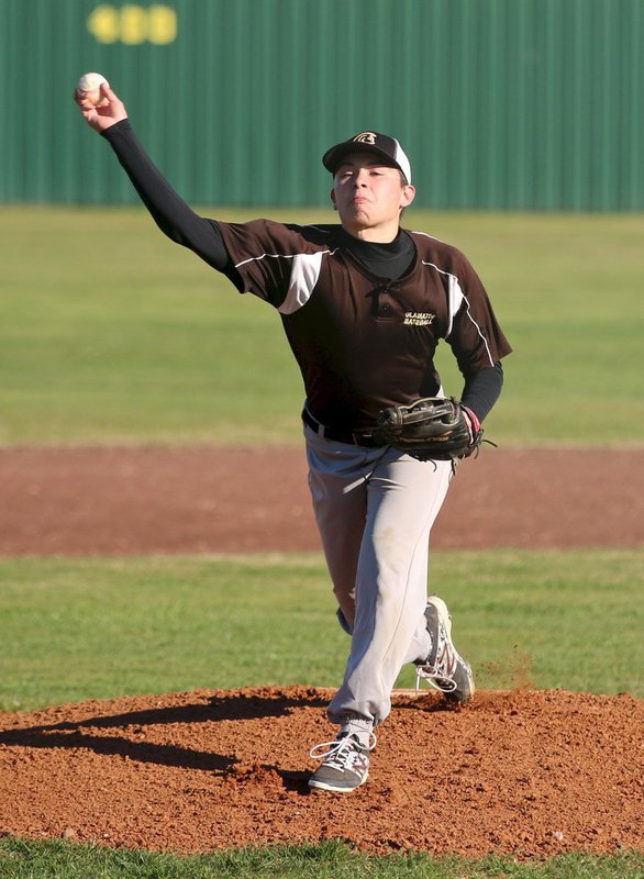 Image: Gladiator pitcher Eli Garcia gets the season of fun started from the mound during a light scrimmage with visiting Avalon.