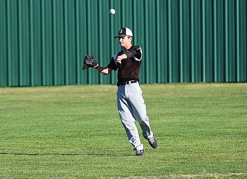 Image: Gladiator Levi McBride enjoys the cool breeze in right field.