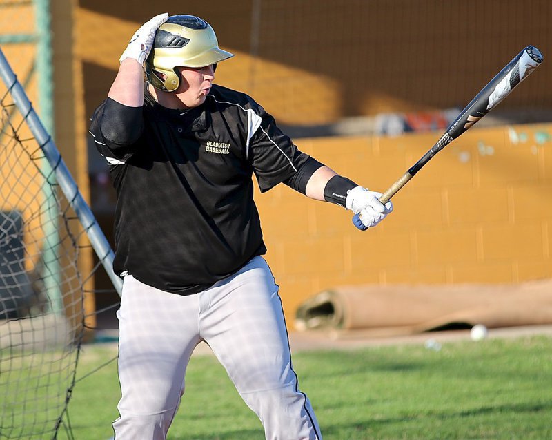 Image: John Byers, one of the district’s best hitters last season, can hardly contain his excitement while digging in at the plate for the first time in 2015.