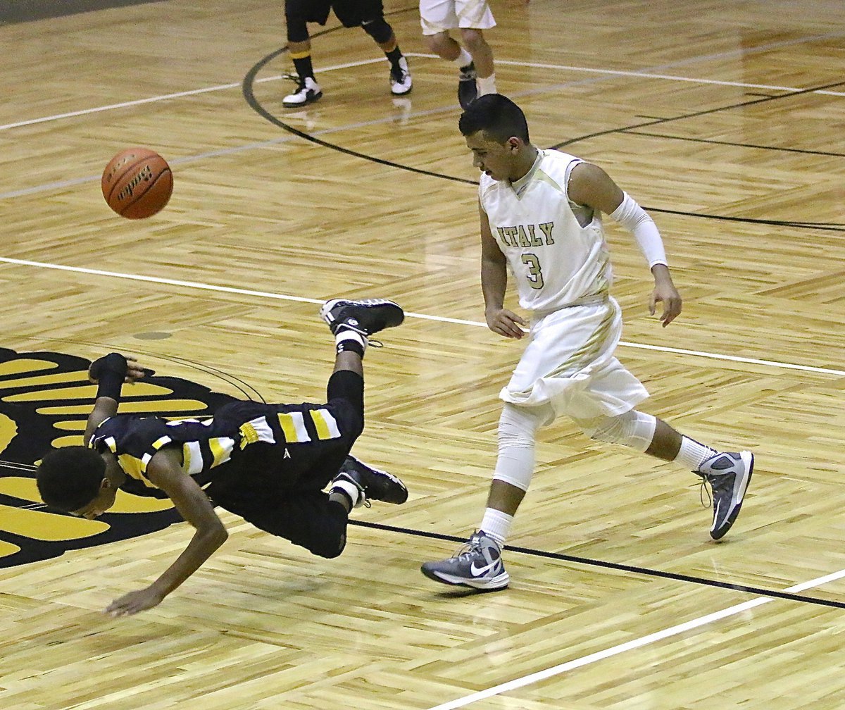 Image: Needing the ball late, JV Gladiator Jorge Galvan(3) forces Itasca to turn the ball over.