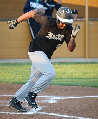 Image: Kenneth Norwood, Jr. tries to make a play after a dropped third strike ball by the Cougars.
