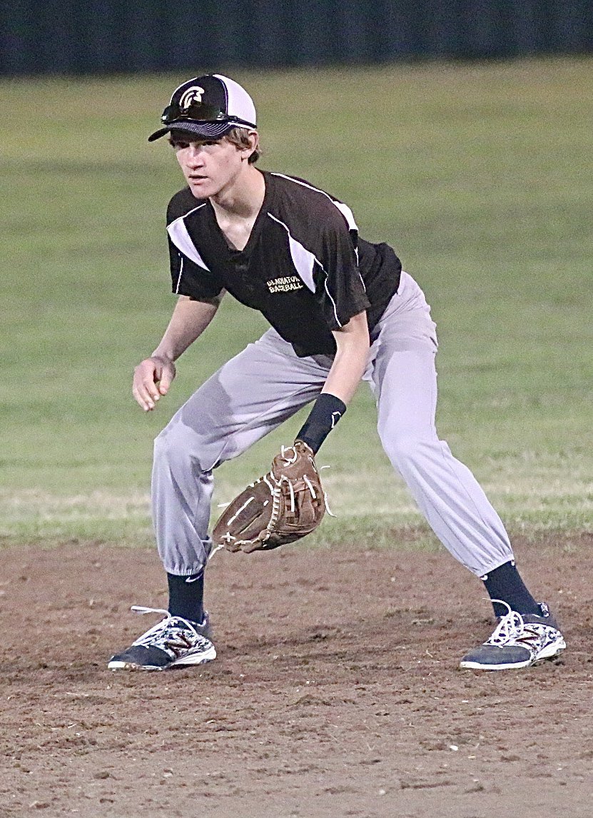 Image: Italy’s Garrett Janek hopes for a grounder at second-base.