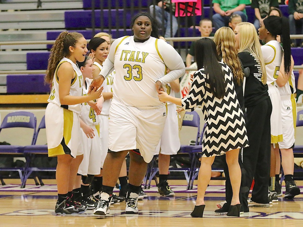 Image: Lady Gladiator junior Cory Chance(33) is introduced before Italy’s area playoff battle against Santo.