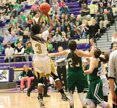 Image: Kortnei Johnson(3) spins and scores for the Lady Gladiators.