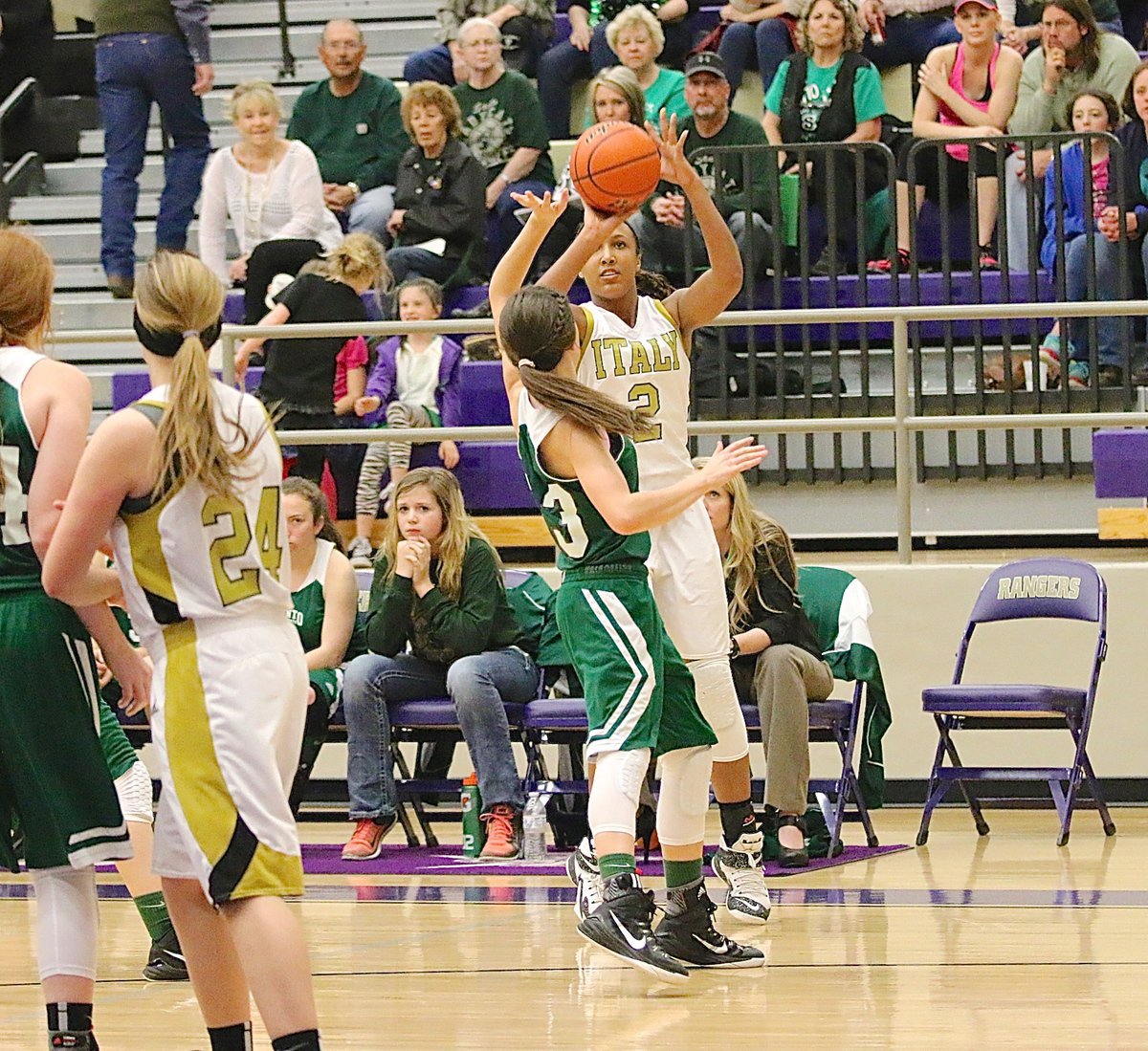 Image: Lady Gladiator Emmy Cunningham(2) sinks one of her three first-half 3-pointers over a Lady Cat defender. Cunningham finished with a game-high 18-points in Italy’s 57-52 playoff loss to Santo.