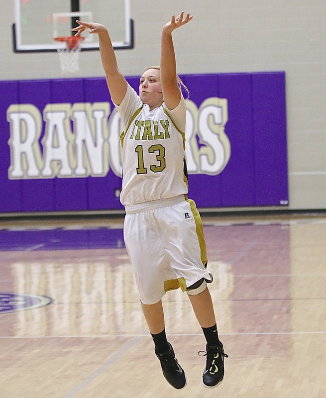 Image: Lady Gladiator Brycelen Richards(13) lets a 3-point attempt fly from well beyond the arc.