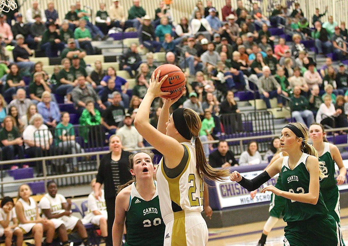 Image: Lady Gladiator Lillie Perry(24) flashes to the basket, receives a backdoor pass and puts up a shot against Santo.