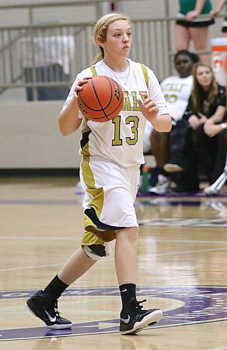 Image: Freshman guard Brycelen Richards(13) brings the ball across mid court for the Lady Gladiators.