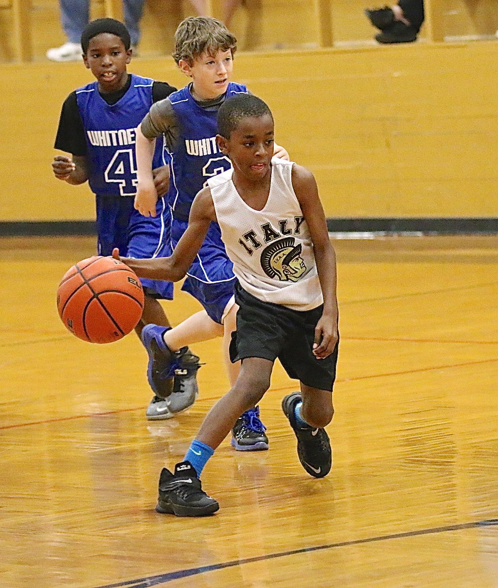 Image: Darrin Jackson(3) weaves his way thru Whitney defenders.