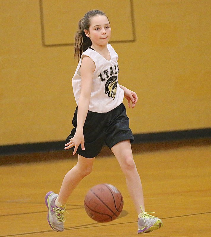 Image: Emily Janek(11) handled the point guard duties for the IYAA’s 5th-6th grade girls team against West.