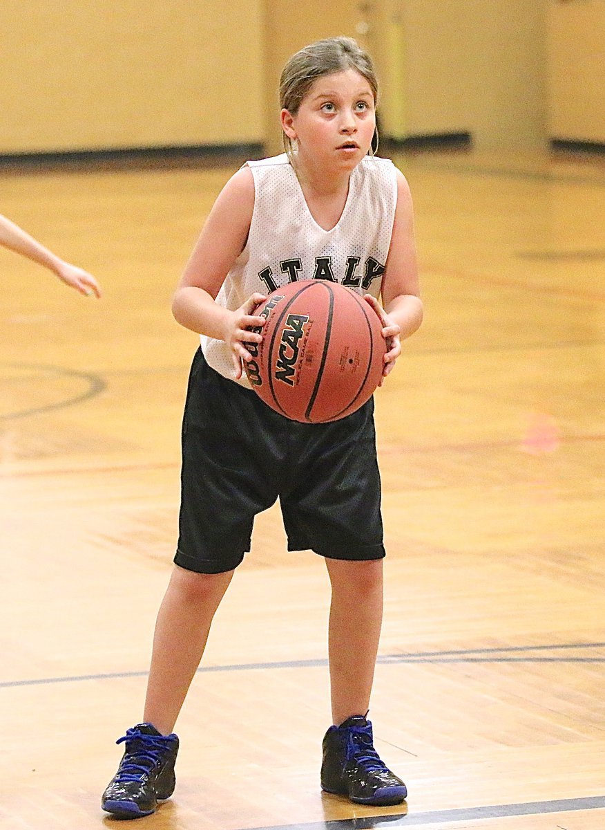 Image: Italy’s Kaylie Stiles-Smith(6) settles in at the line to put in a free throw. Kaylie finished with a team-high 1-point.