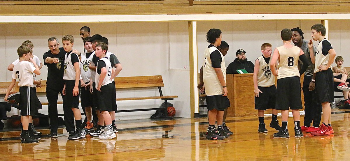 Image: Both head coaches Kyle Holley (Italy White) and Jasenio Anderson (Italy Gold) direct their teams in crunch time during a timeout.