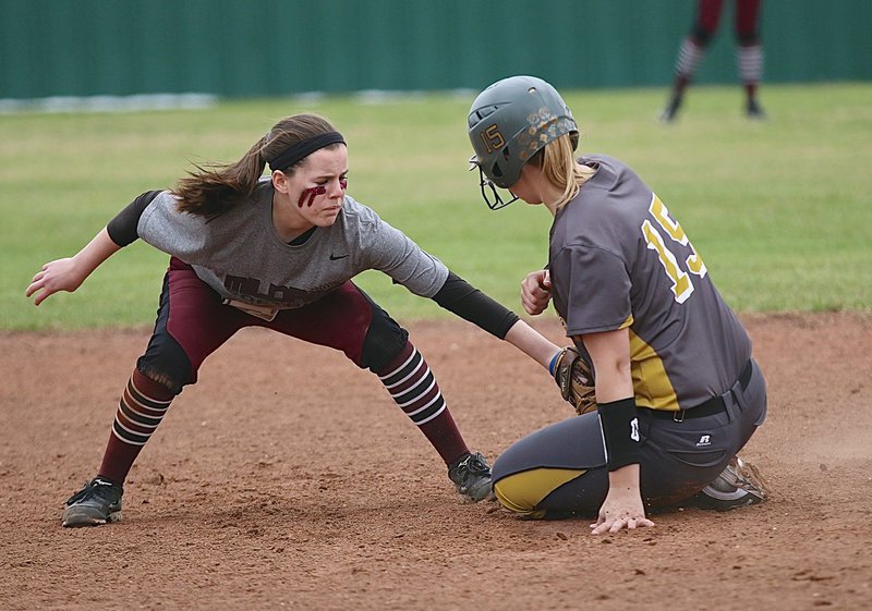 Image: Italy’s Jaclynn Lewis(15) slides safely into second-base to beat Mildred’s tag.