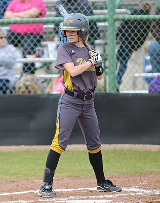 Image: Britney Chambers(4) is poised and confident at the plate for Italy.