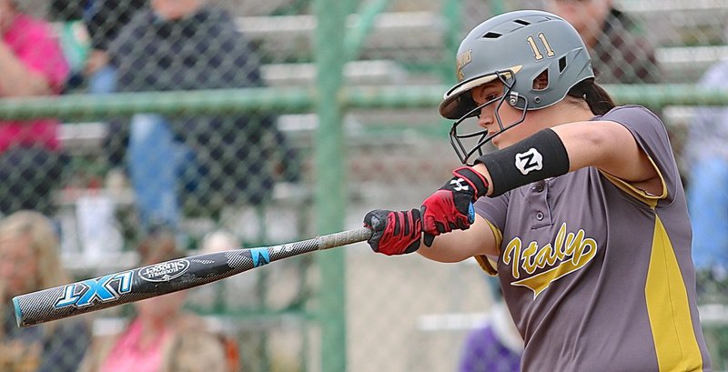Image: Lady Gladiator Jenna holden(11) takes a practice swing before going to the plate against Mildred.