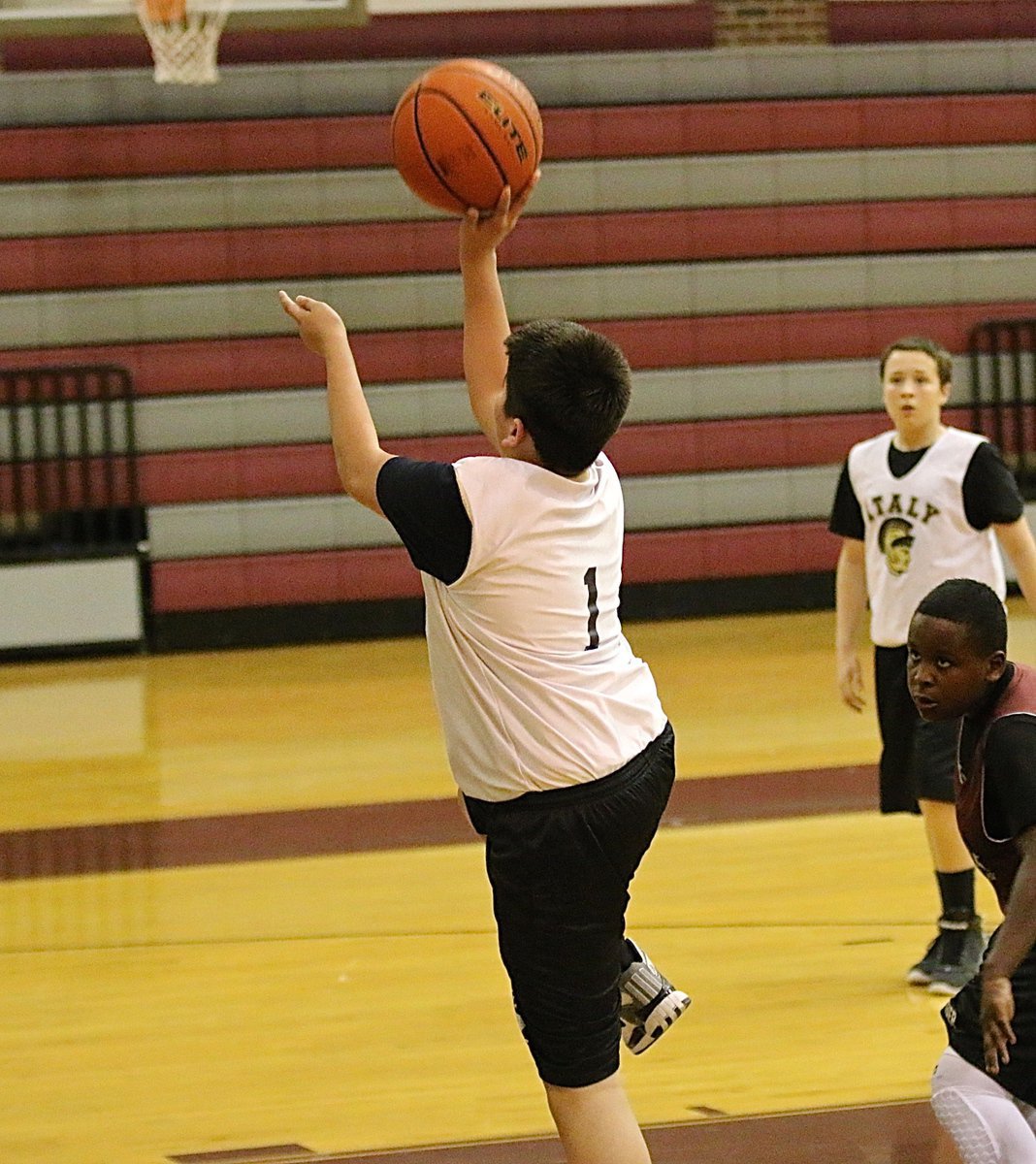 Image: Andrew Celis(1) gets an open look at the basket.