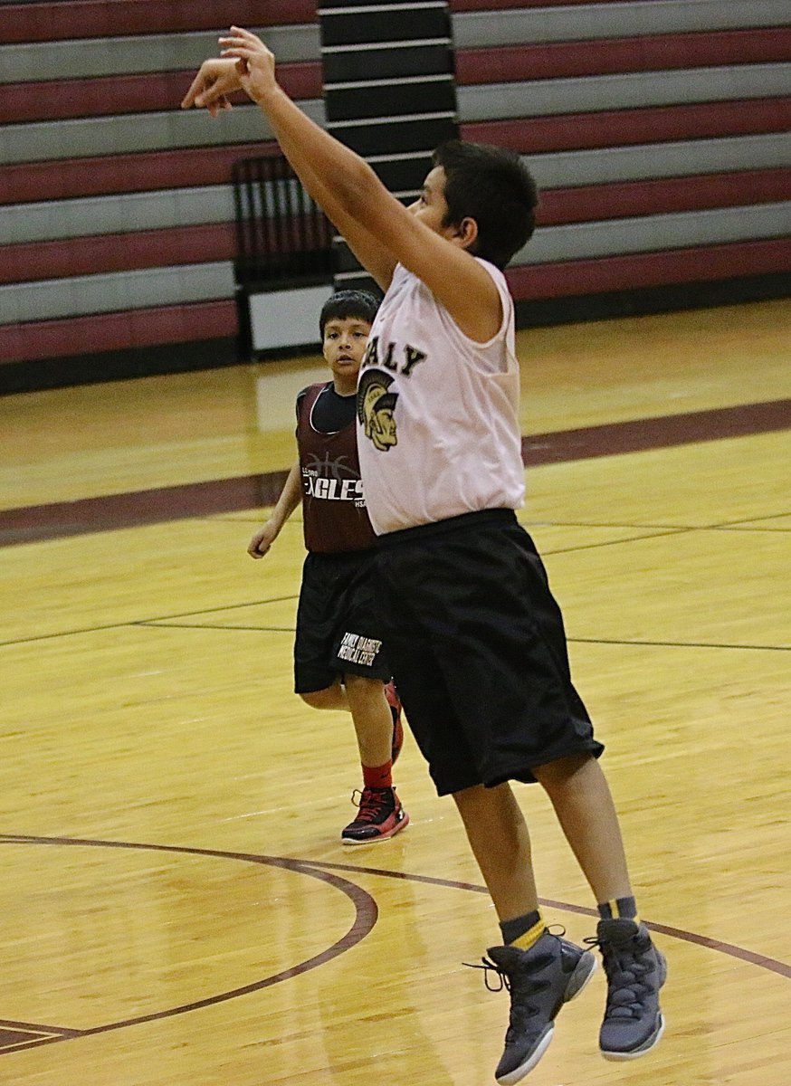 Image: Omar De La Hoya(6) let’s a shot fly from the left wing against Hillsboro.