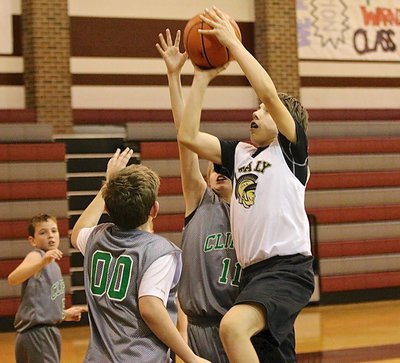 Image: Grant Hamby(9) drives the lane for a bucket against Chilton.