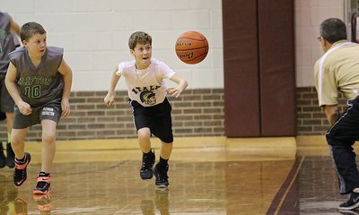 Image: Kort Holley(2) picks the pocket of Chilton’s guard, tracks down the loose ball with his dad/coach Kyle Holley urging him forward.