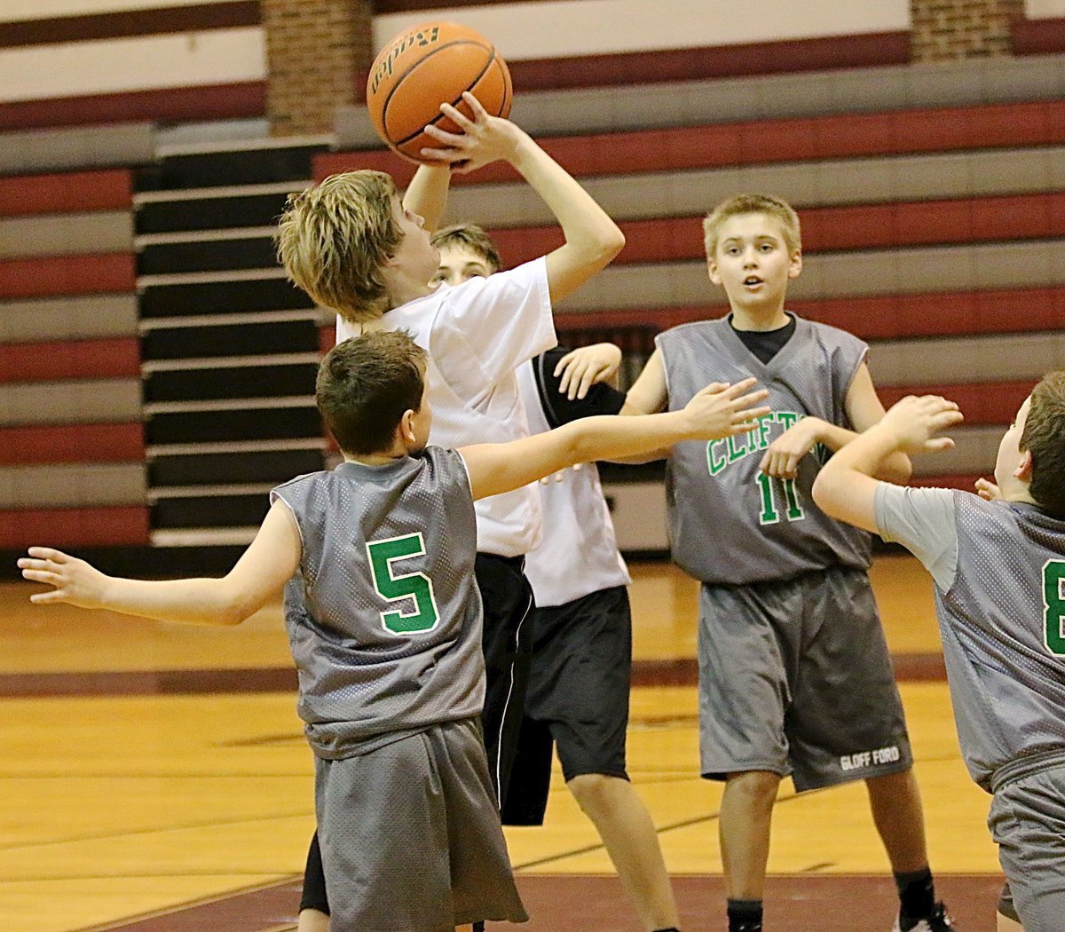 Image: Reese Janek(12) drives into the lane to put up a shot against Chilton.