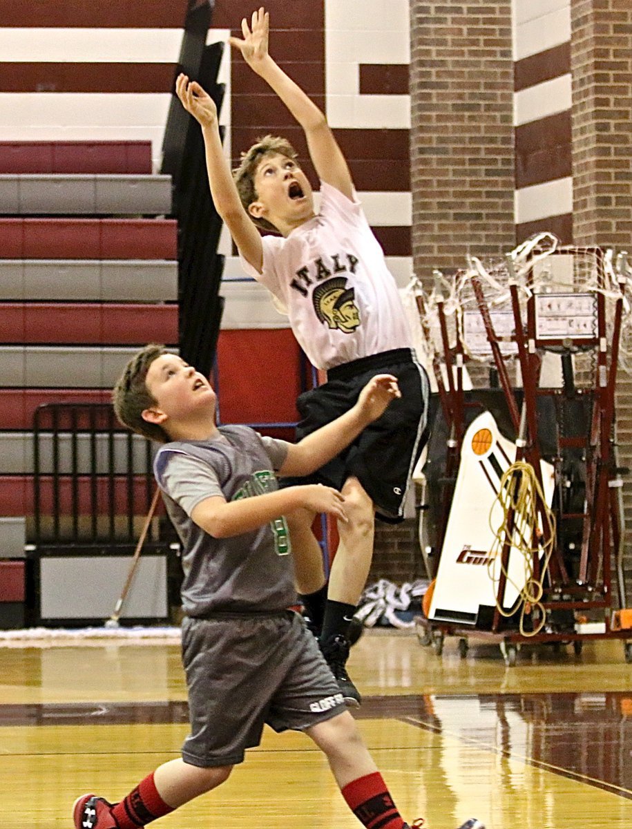 Image: Kort Holley(2) scores the layup but Chilton was called for the holding foul before Holley could finish the drive.